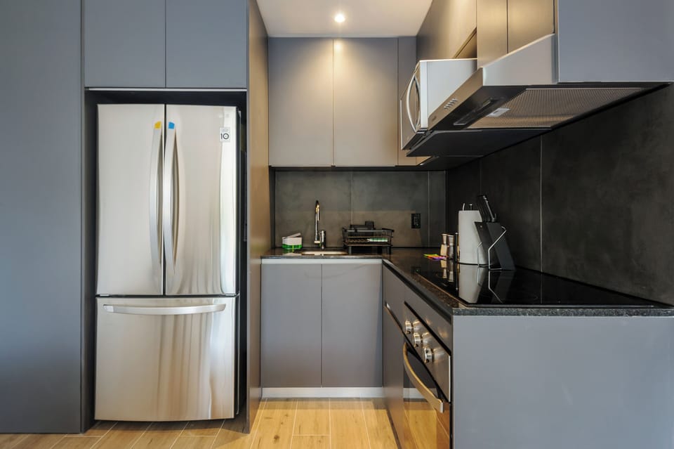 Apartment, 2 Bedrooms | Private kitchen | Microwave, stovetop, cookware/dishes/utensils