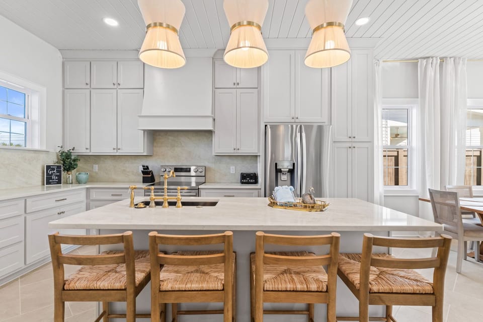 An eat‑in island with seating for four creates a natural gathering spot for breakfast, snacks, or casual conversations while cooking.