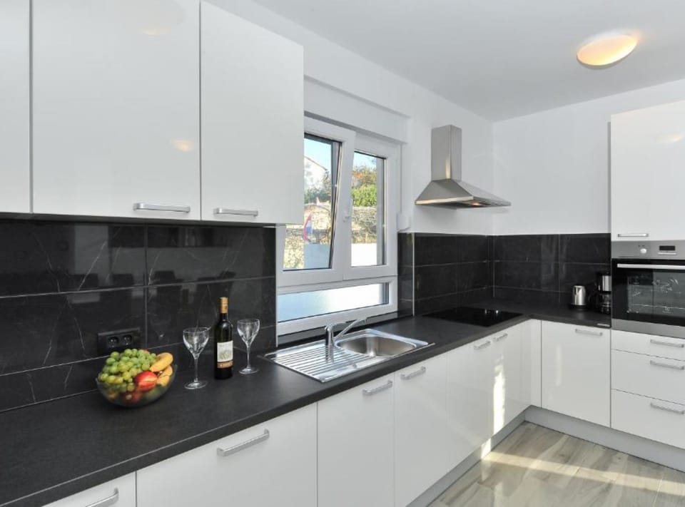 House (Two bedroom Villa with pool) | Private kitchen | Fridge