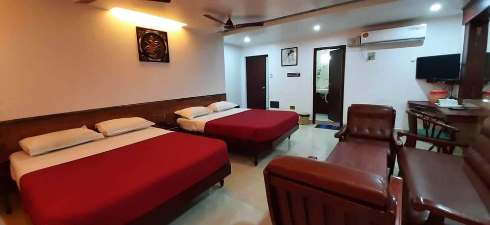 Deluxe Quadruple Room | Premium bedding, desk, free WiFi, bed sheets