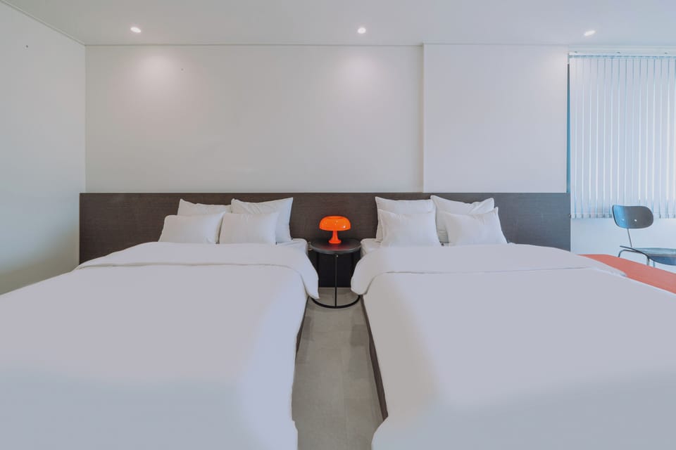Deluxe Twin Room, Balcony, Beach View | Desk, free WiFi