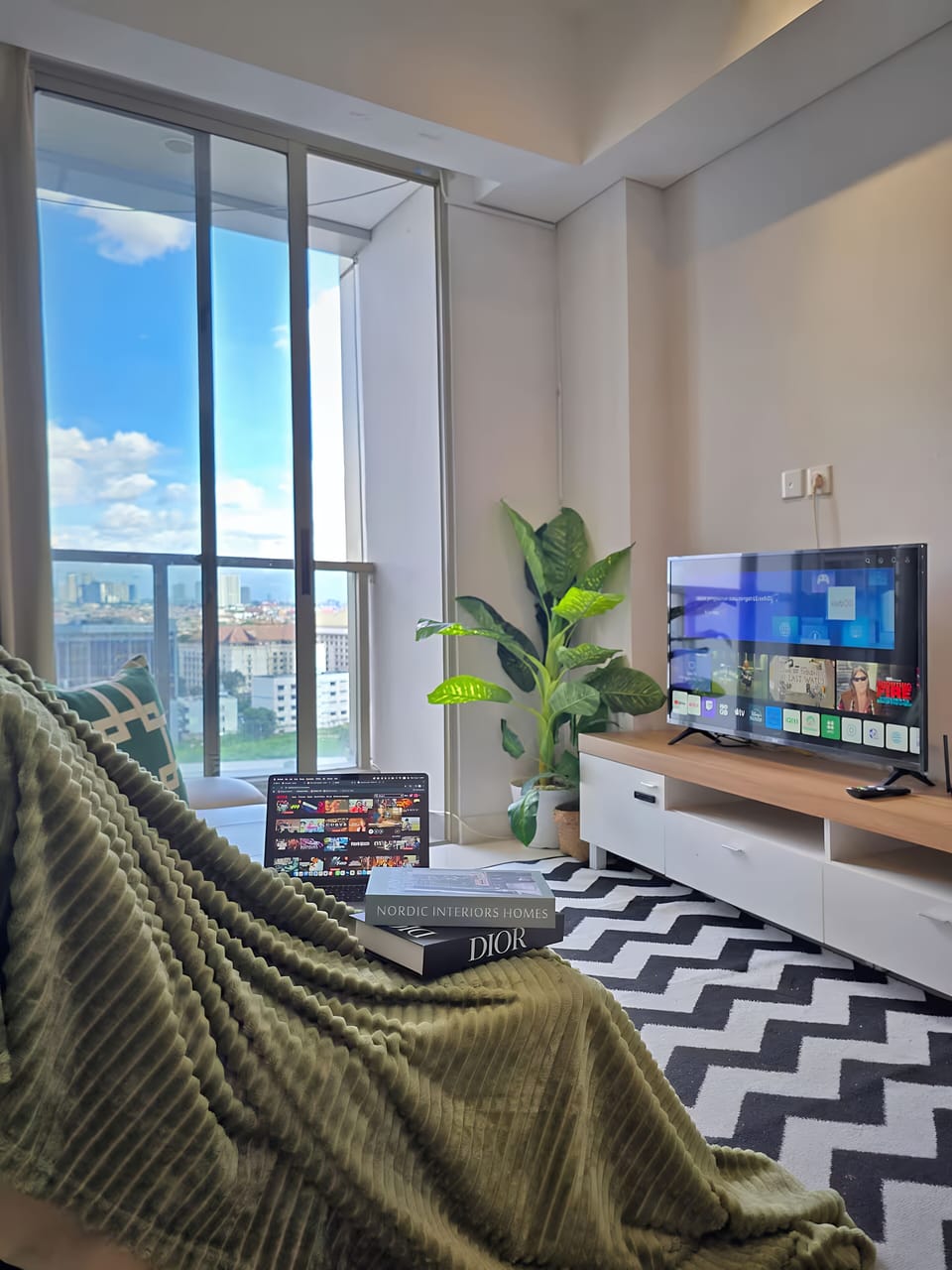 Apartment, 2 Bedrooms, City View | Living area | 43-inch Smart TV with cable channels