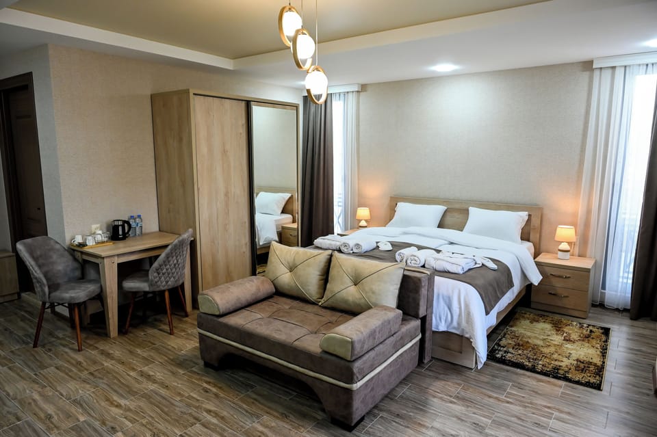 Comfort Double Room, Balcony, City View | Desk, iron/ironing board
