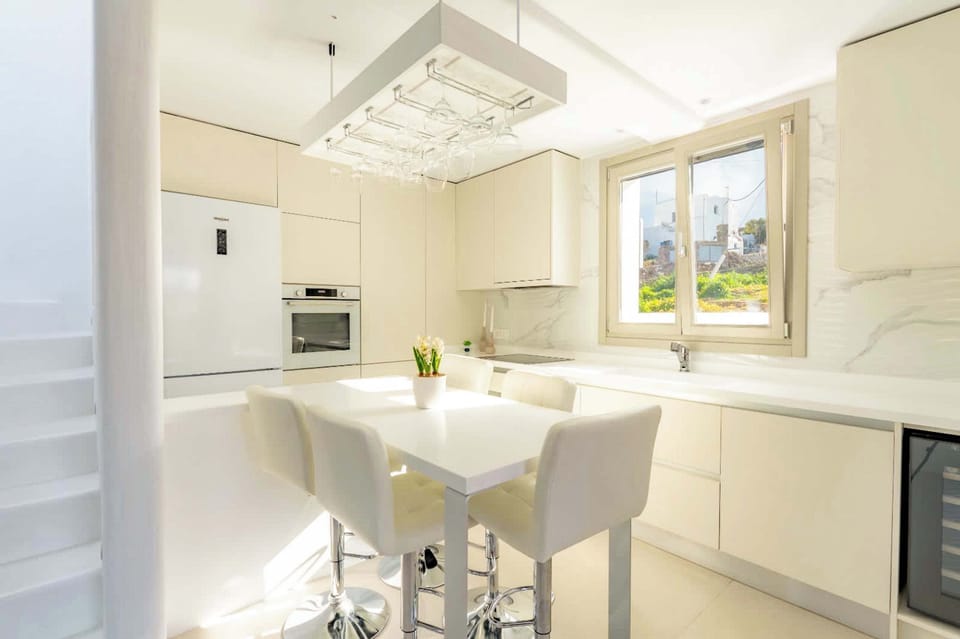 Fully equipped modern kitchen with dining space