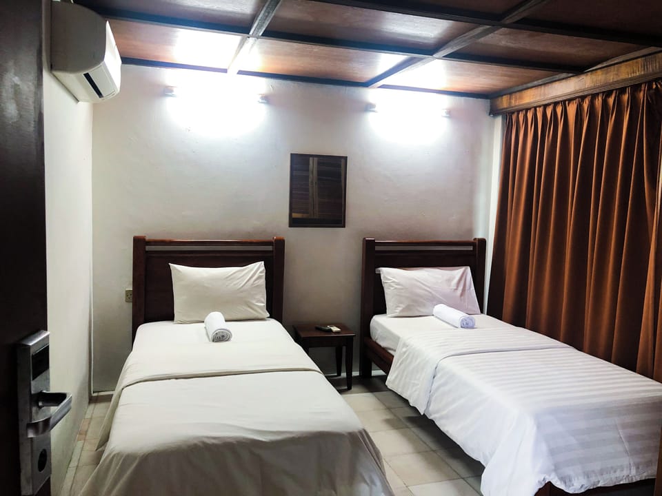 Twin Room | Iron/ironing board, free WiFi