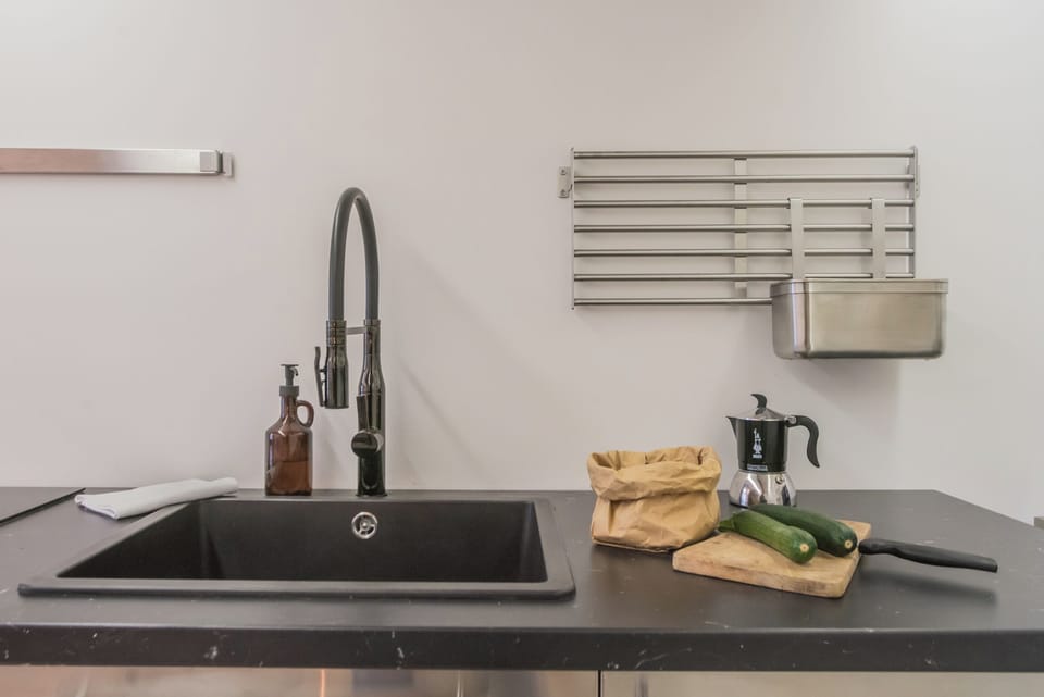 Apartment (1 Bedroom) | Private kitchen | Microwave, espresso maker, highchair