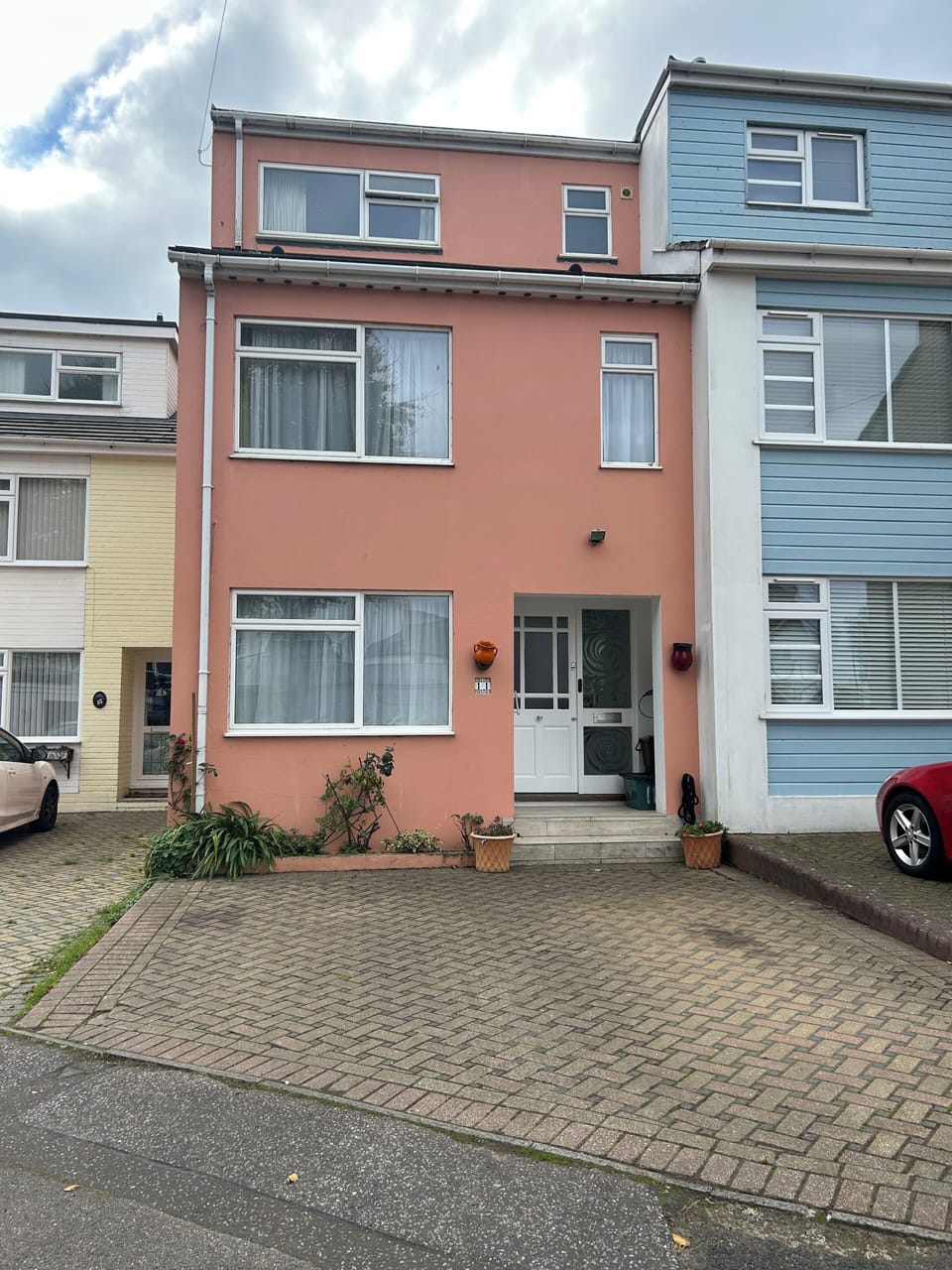 front of house and driveway for 2 cars