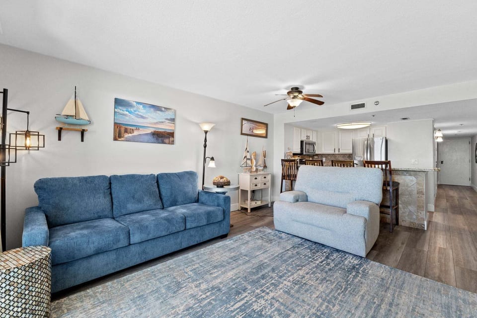 The seating is arranged to take advantage of both the TV and the outdoor views.