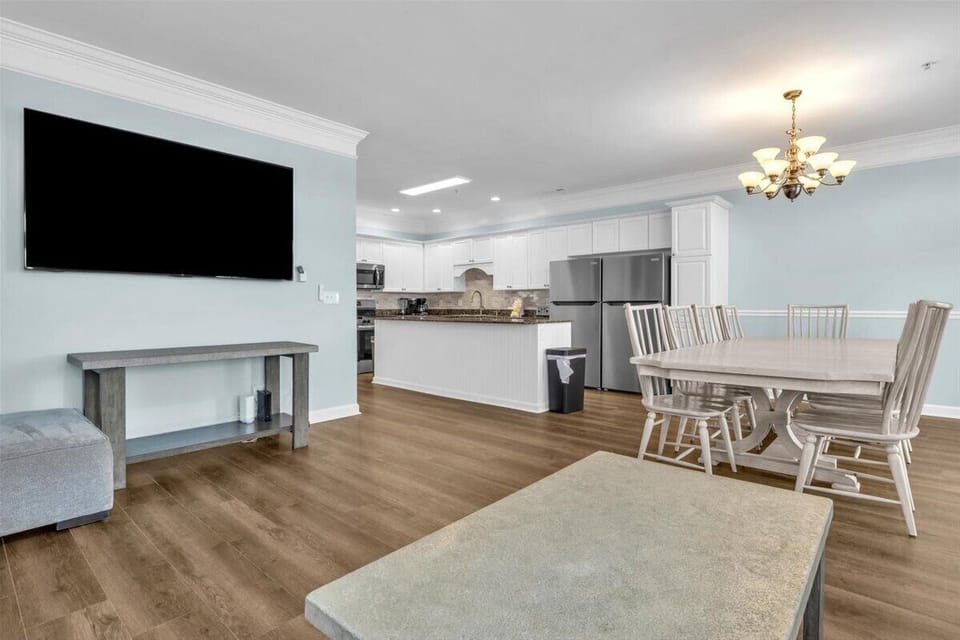 View from Living Room into Kitchen and Dining Are