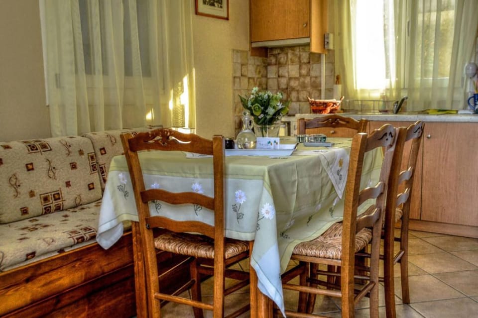 Dining area within the accommodation providing a comfortable space for meals or planning your day’s activities.