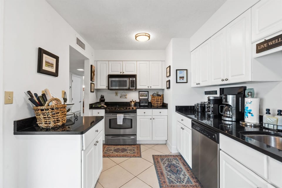 Your fully-equipped kitchen awaits with stainless steel appliances, granite countertops, and everything you need to create memorable meals during your stay.