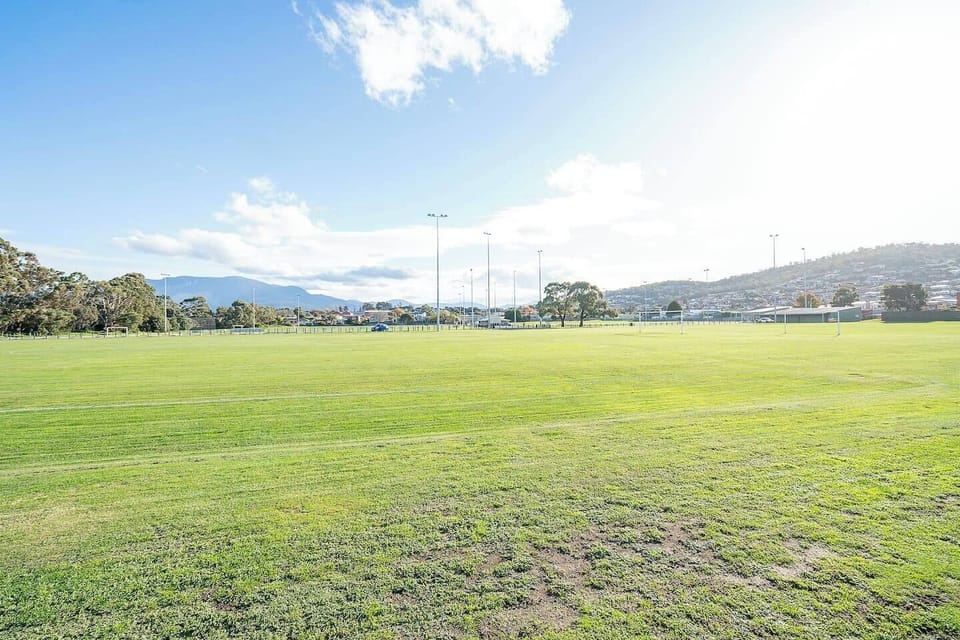 Step out to the open fields of Wentworth Park directly behind your home—perfect for jogs, sports or watching weekend games.
