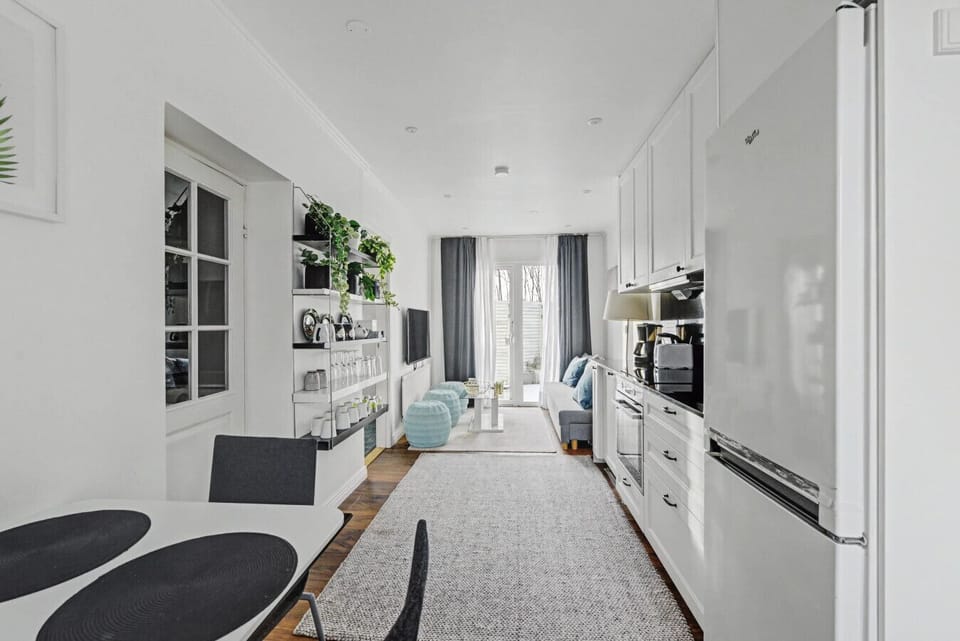 Fully equipped kitchen with modern appliances, generous storage, and open flow into the living area and patio. Ideal for families and small groups staying together comfortably.