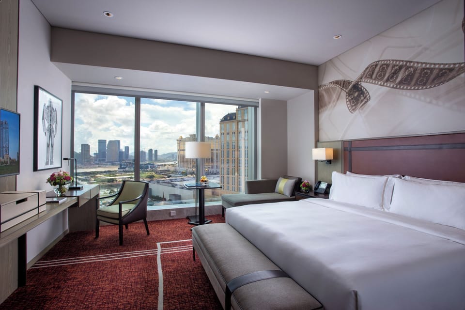 Celebrity Vista King Room | Minibar (some free items), in-room safe, desk, blackout drapes