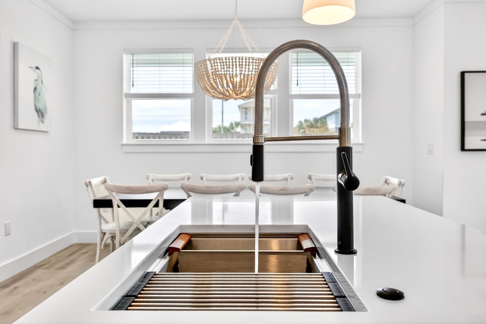 1st Floor - Gourmet chef’s kitchen featuring premium GE Monogram appliances and a 6-burner gas stove—perfect for cooking for a crowd