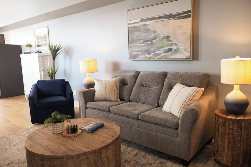 Relax after a long day of adventuring in this beautiful living room in Loft #4.