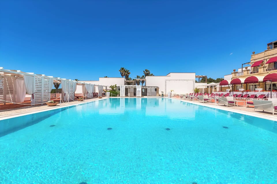 Superior Apartment, Sea View | Pool | Seasonal outdoor pool, pool umbrellas, sun loungers
