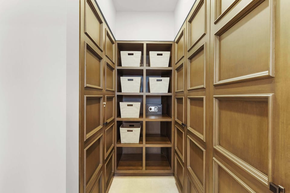 Generous storage with custom built-ins for an organized, elevated stay.