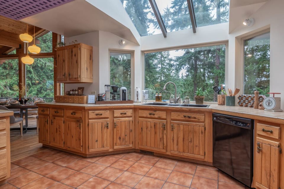 Spacious, fully equipped kitchen with generous prep space — perfect for group meals and slow cabin mornings.