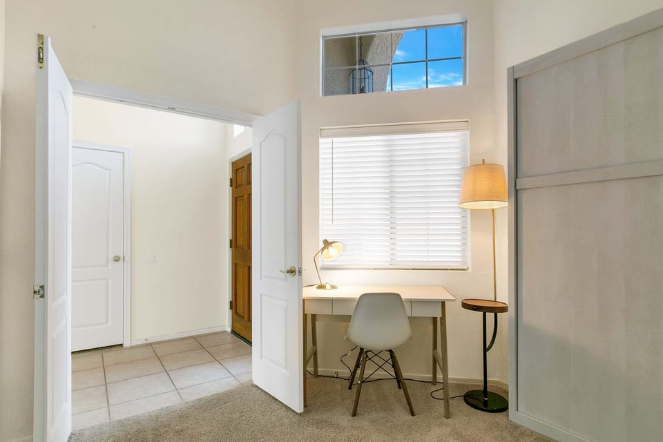 Den with workstation and Murphy bed