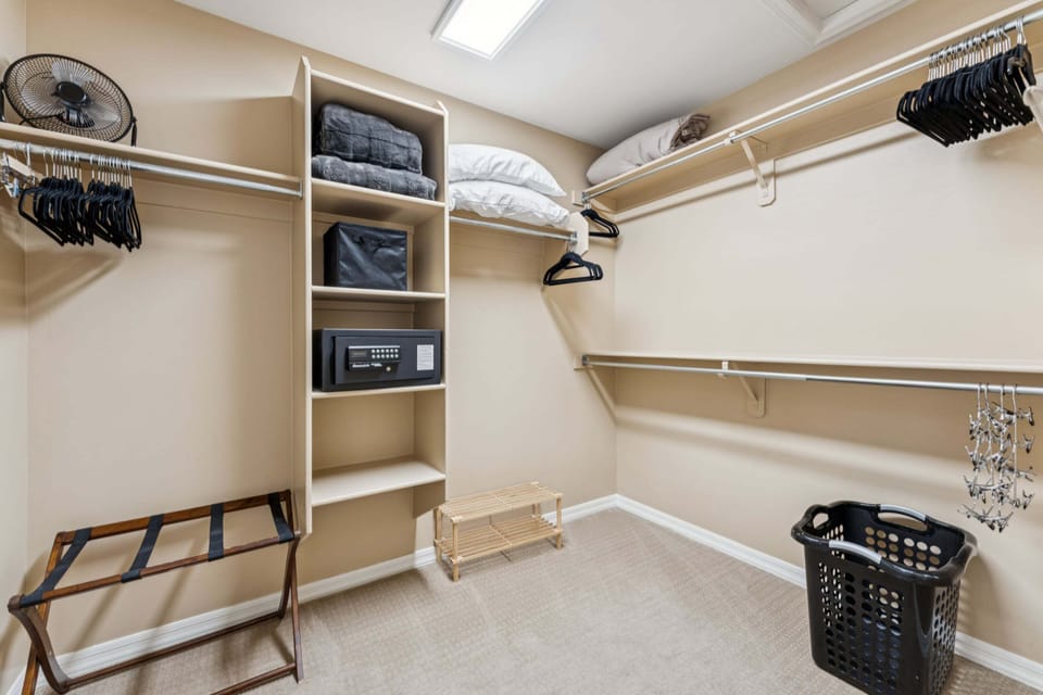 Enjoy a roomy walk-in closet and secure safe in the main bedroom for stress-free travel