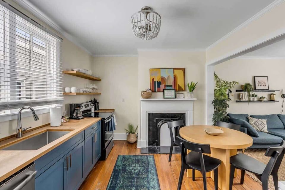 A well-appointed kitchen paired with a comfortable dining space for 4 guests.