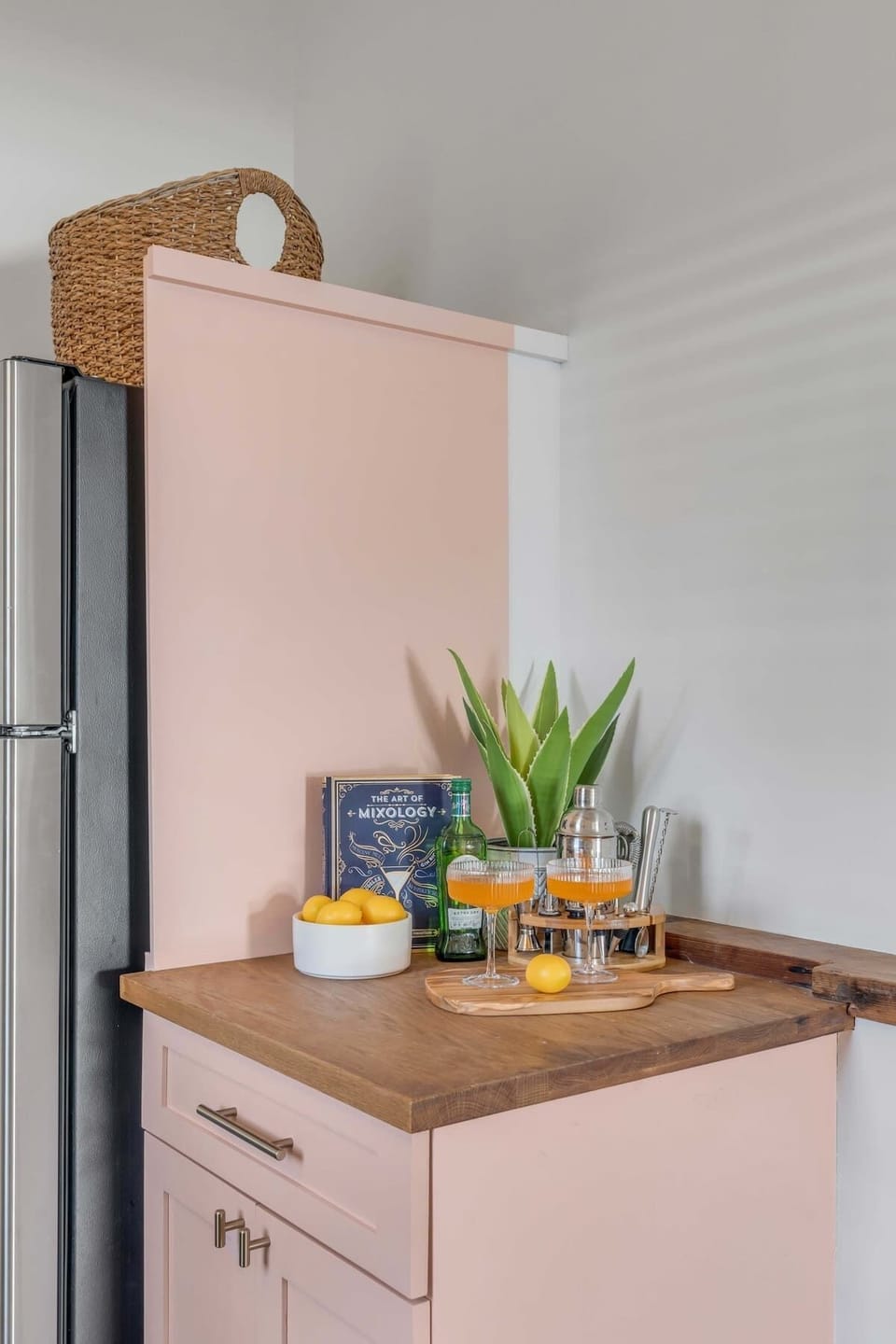 A fully stocked kitchen with modern appliances, cookware, dishes, and coffee maker for meals at home.