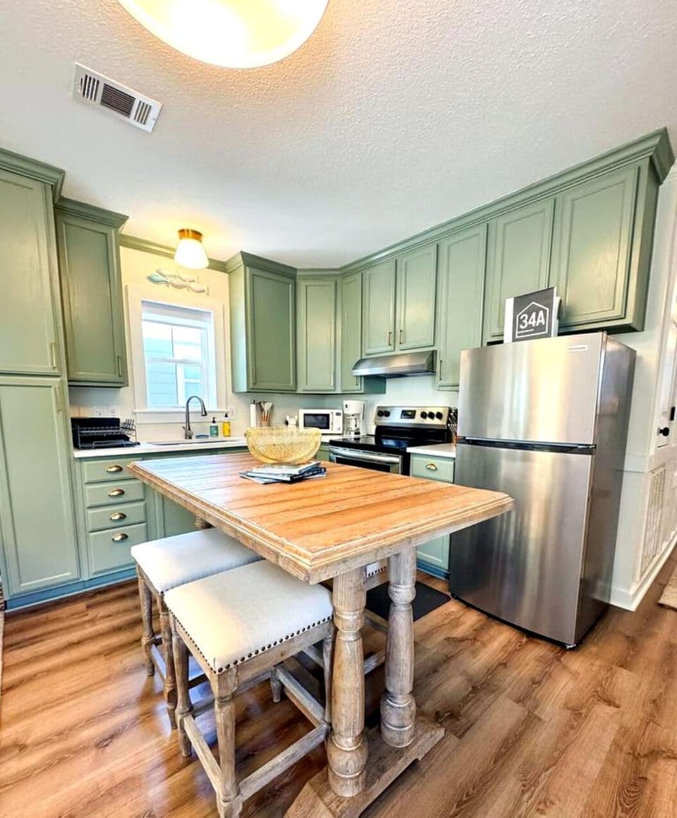 Pass Porch | Coastal Cottage on 2nd St | Private kitchen | Coffee/tea maker, full-size fridge, oven, stovetop