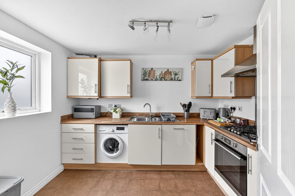 A fully equipped kitchen, complete with everything you need to prepare a home-cooked meal.