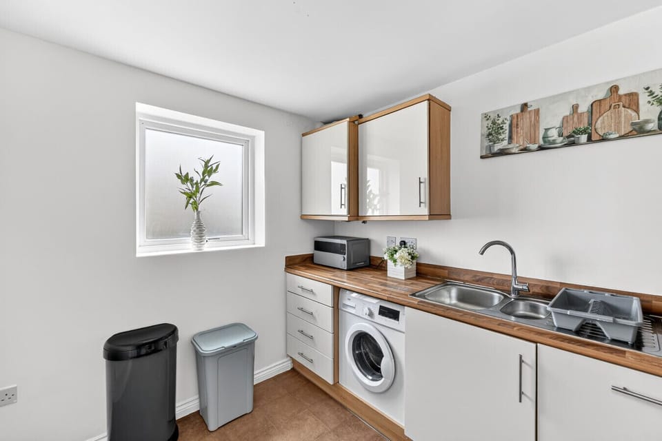 A fully equipped kitchen, complete with everything you need to prepare a home-cooked meal.