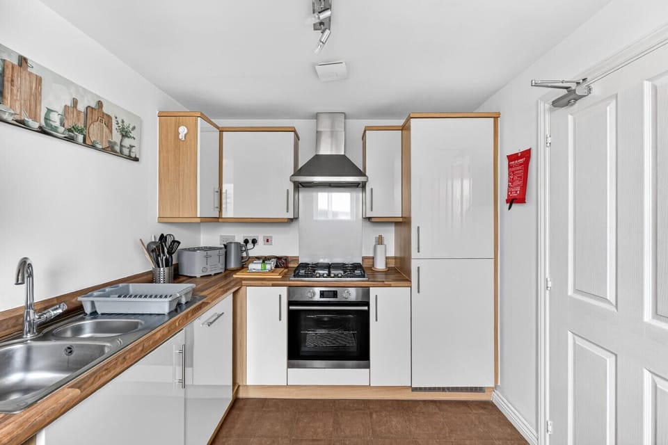 A fully equipped kitchen, complete with everything you need to prepare a home-cooked meal.