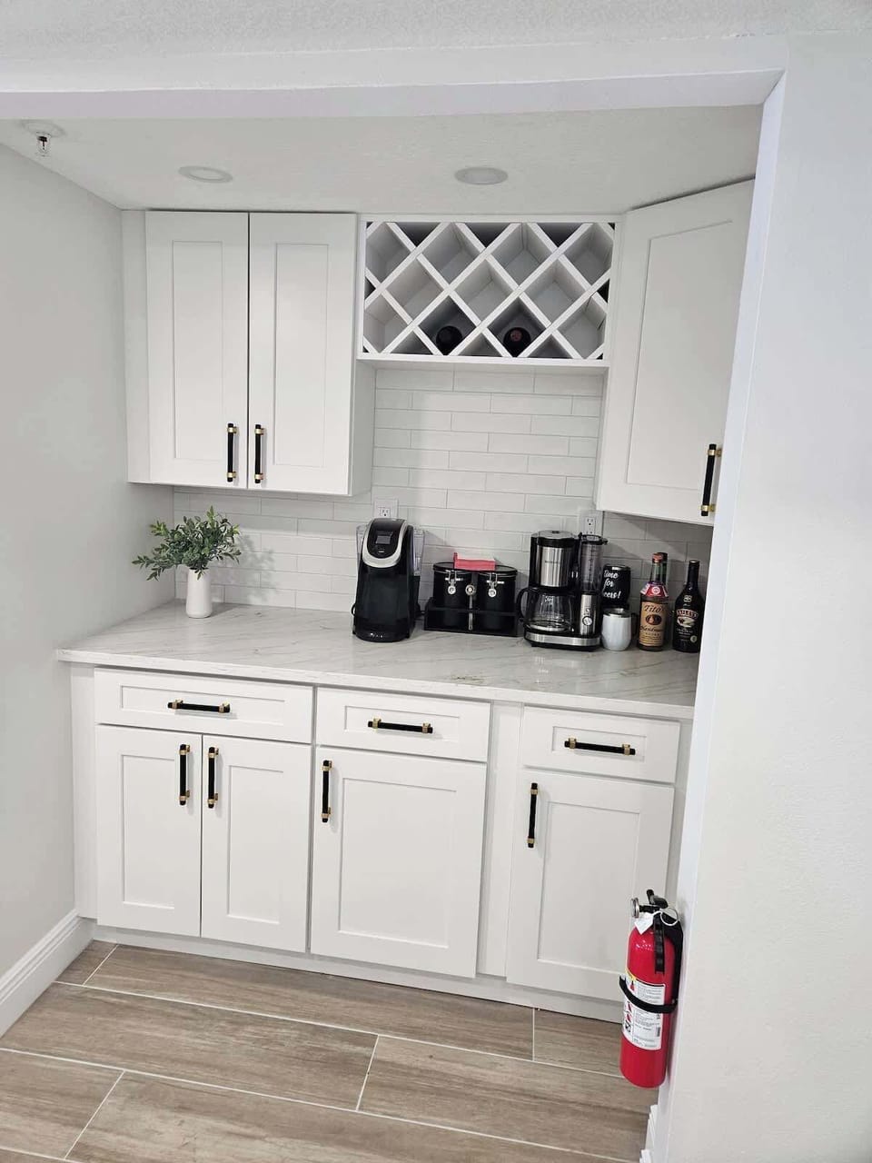 Coffee, tea, and wine bar with a Keurig and a regular coffee pot. Will include sweeteners, tea bags, and coffee beans. 