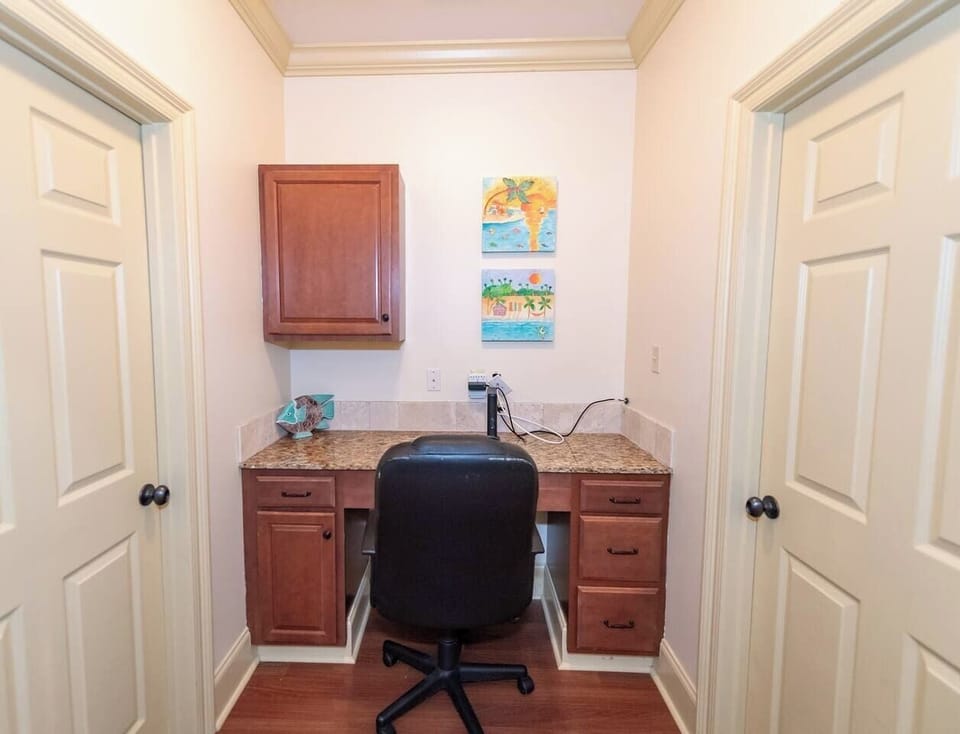 Office area between the second and third upstairs bedroom.