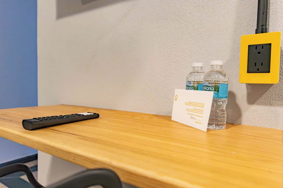 Desk, laptop workspace, free WiFi, bed sheets