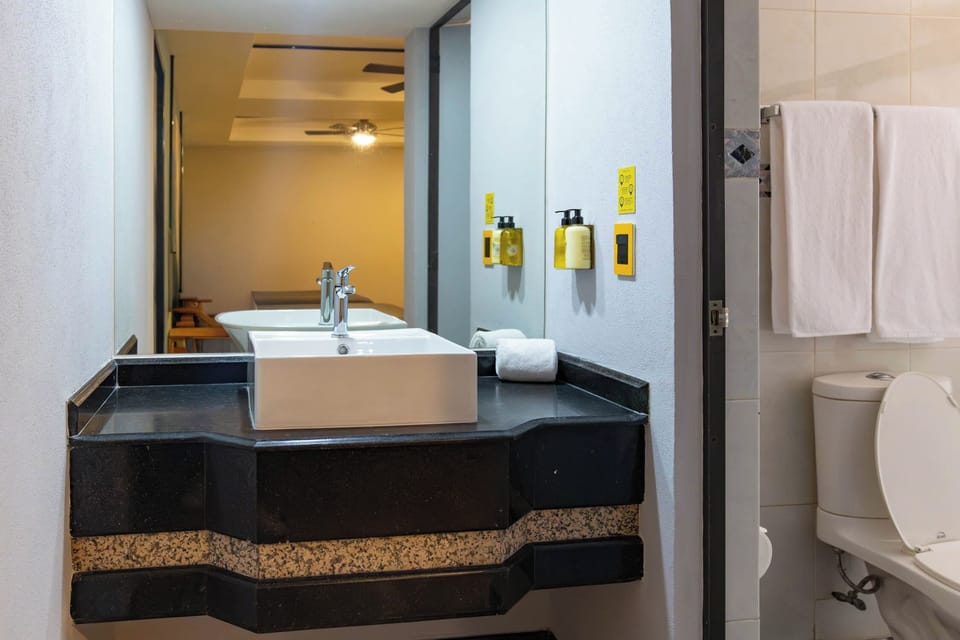 Shower, rainfall showerhead, towels
