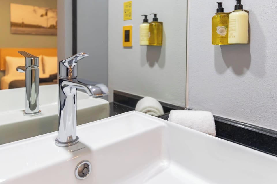 Shower, rainfall showerhead, towels