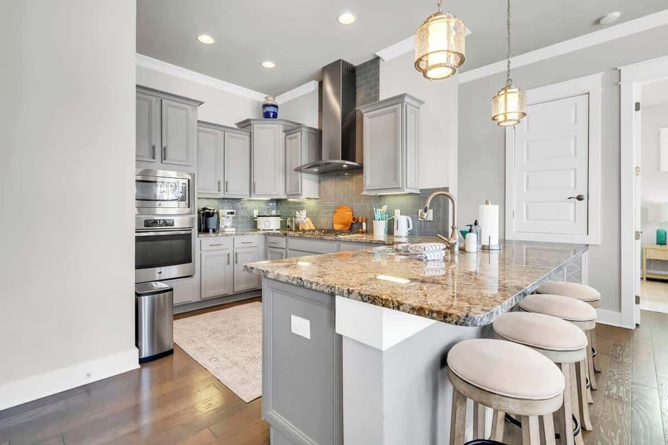 Enjoy the fully stocked kitchen with island seating
