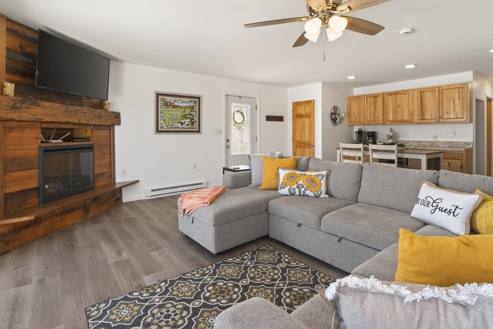 Wooden fireplace beside seating area