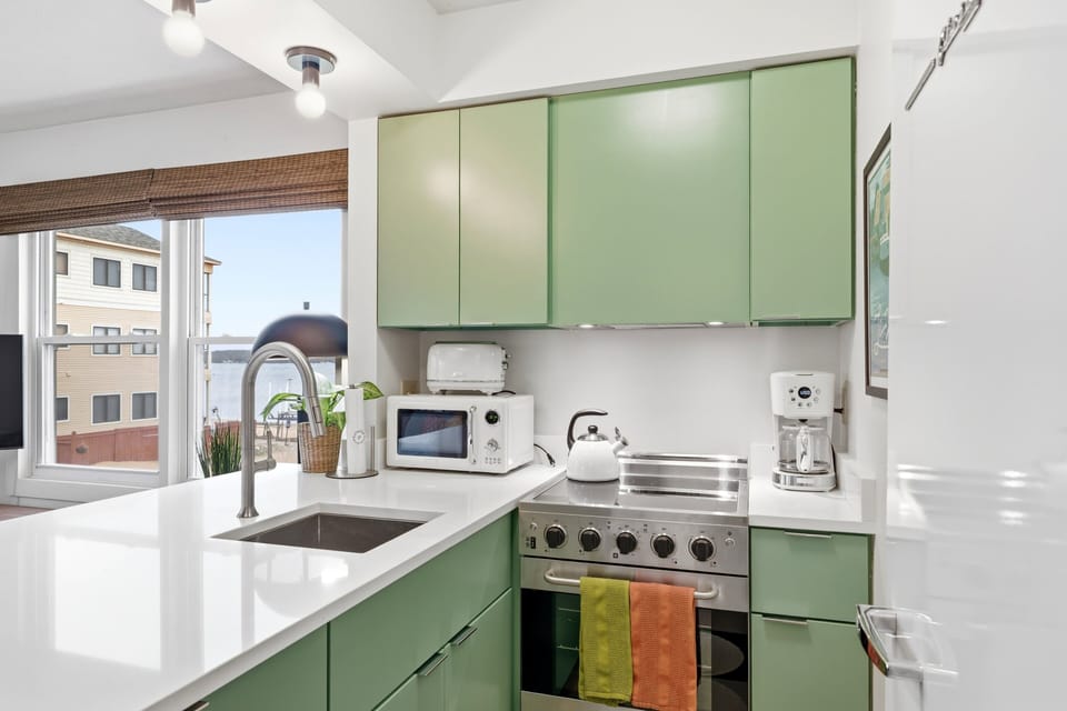 Kitchen has everything you'd need for a long weekend.