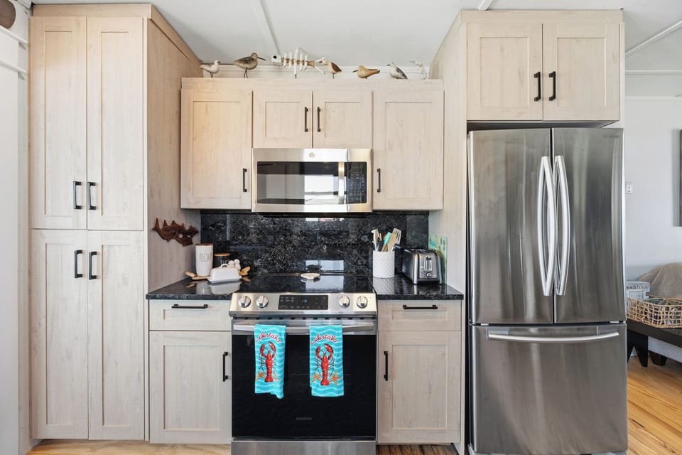 The well-equipped kitchen offers everything needed for easy vacation cooking, from quick beach breakfasts to casual family dinners.