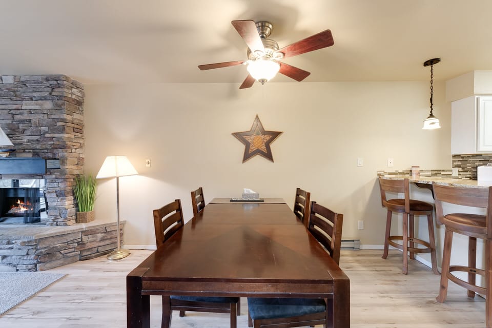 Dining table with seating for four. | Main Level