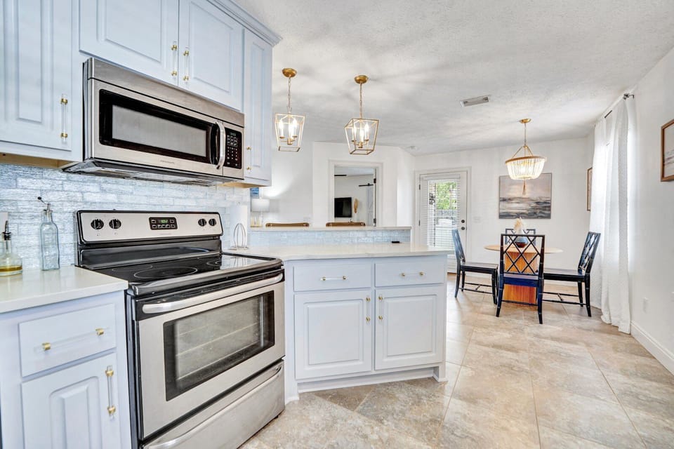 Kitchen is conveniently situated to cook and entertain at the same time