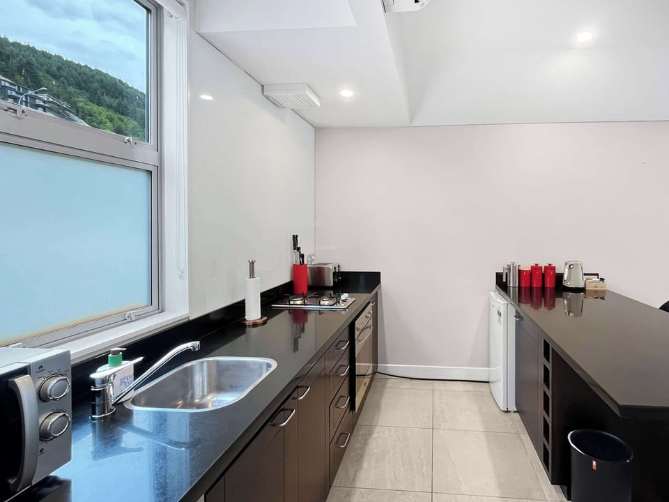 Sleek kitchen with quality appliances
