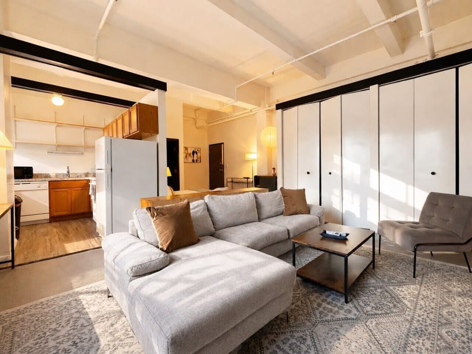 Bright, open-concept living area designed for both relaxation and productivity