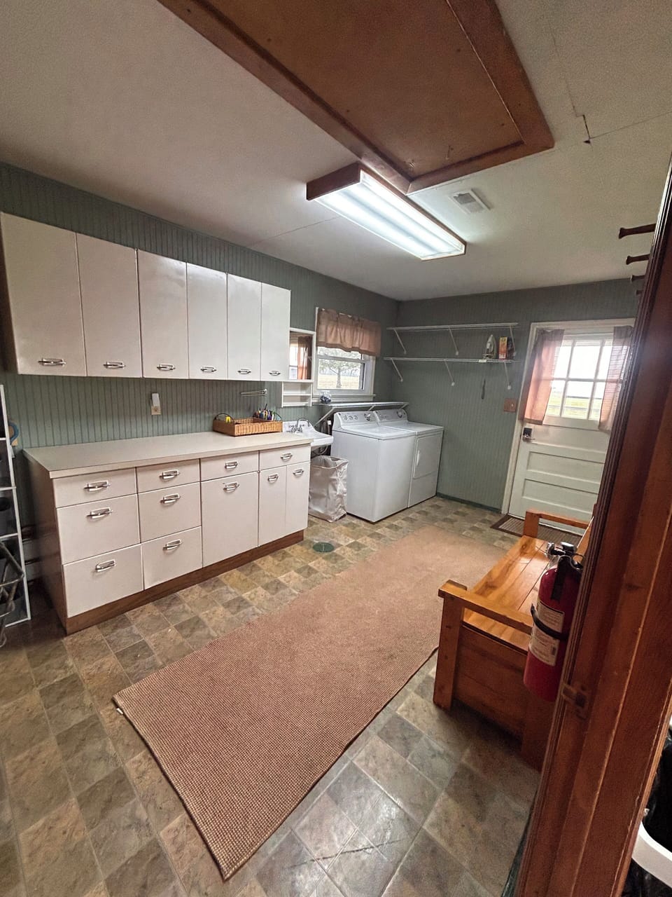 Utility room with extra counter space and laundry facilities for your use