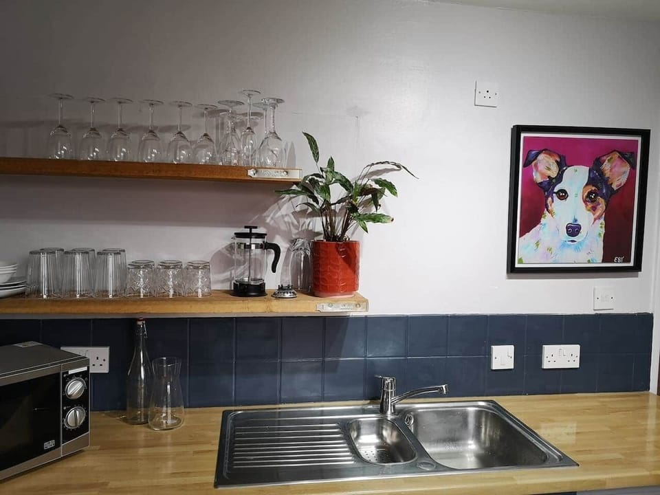 fully equipped kitchen with complimentary tea, coffee, sugar and milk