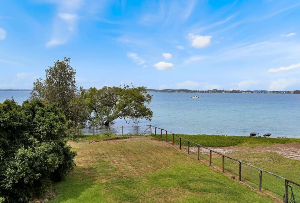 Backyard of the property facing the beach.