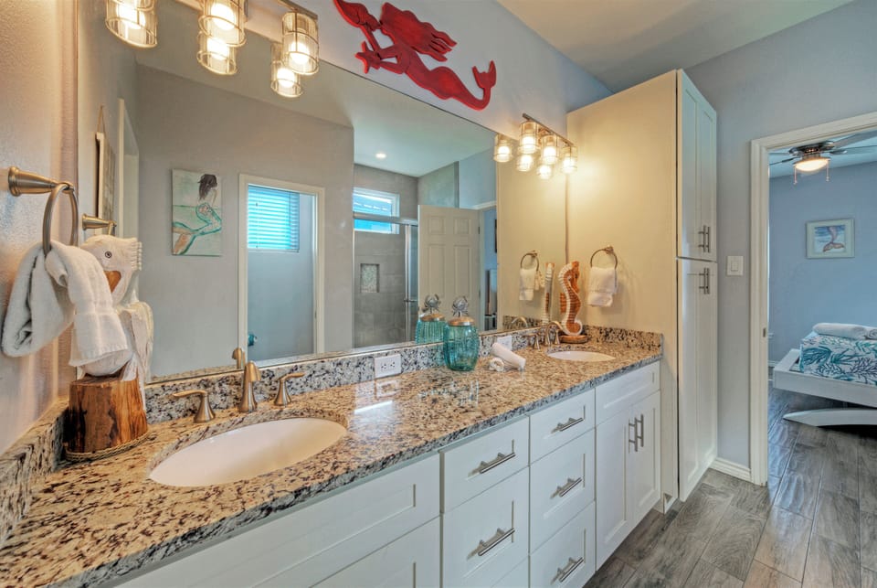 The primary bedroom's ensuite features a shower.