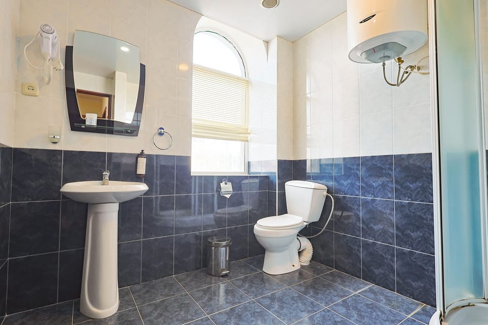 Triple Room, Garden View | Bathroom | Slippers