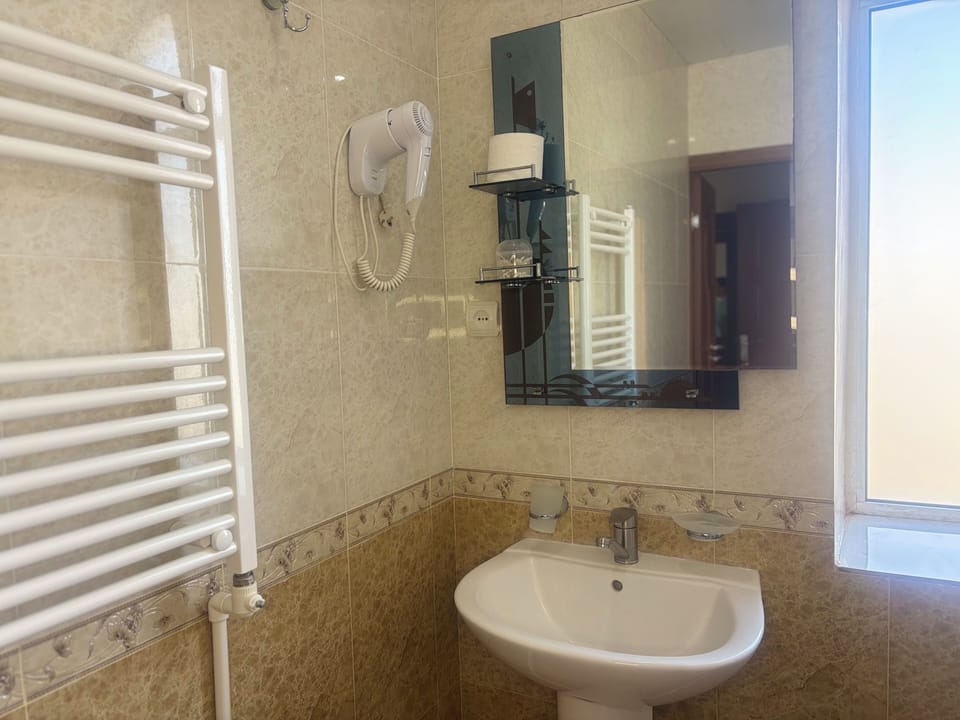 Deluxe Double Room, Balcony | Bathroom | Slippers